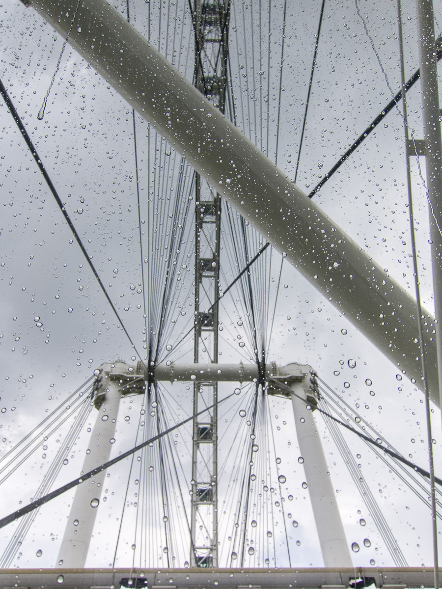 A rain shower begins as the Singapore Flyer cabin nears the end of its rotation.