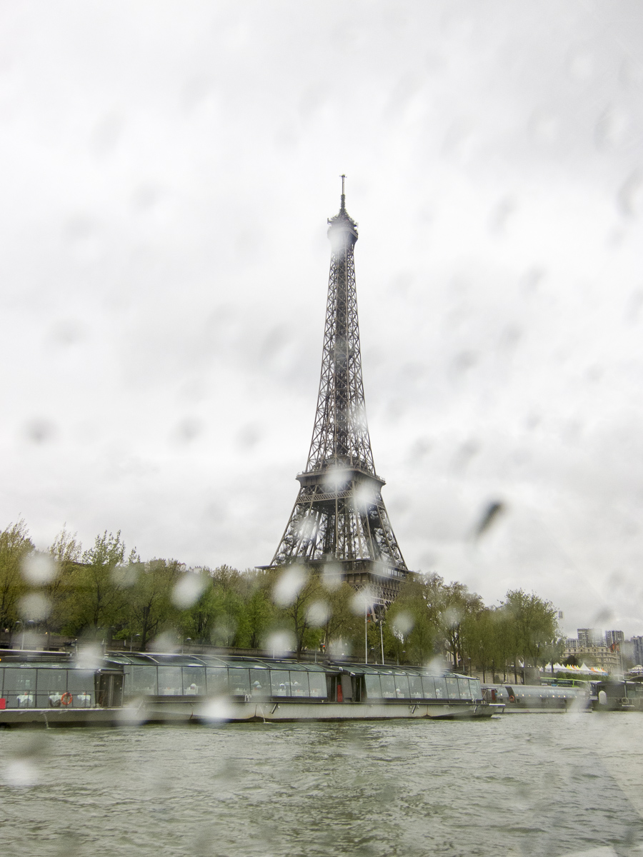 Looking at the Eiffel Tower from the Batobus, in the rain.